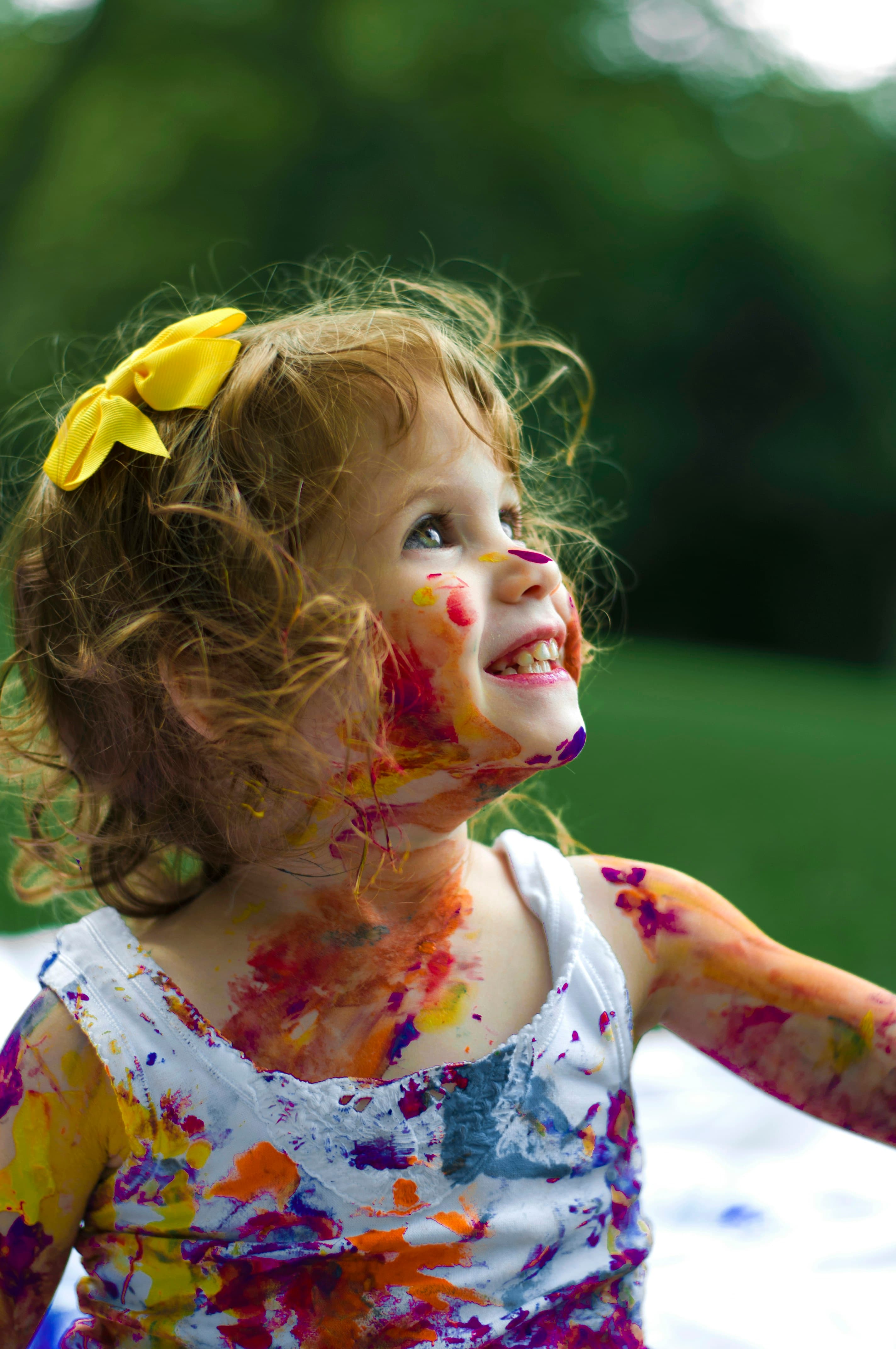 Child enjoying a sensory-friendly outdoor activity